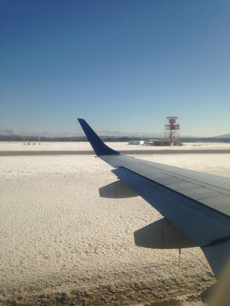 airplane wing tip in the air