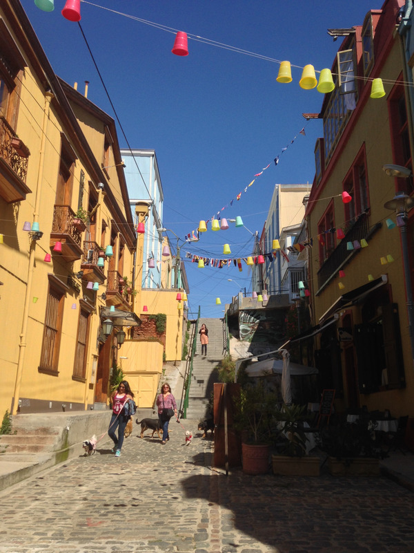 yellow buildings and overhead streamers